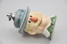 Accendino da tavolo in testa