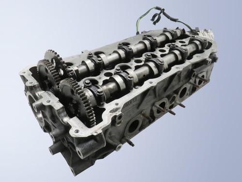 Testata motore con - testata, a