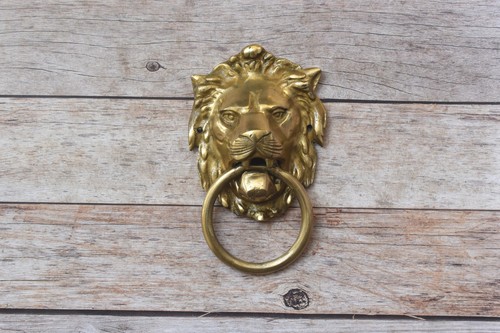 Maniglia battente porta leone