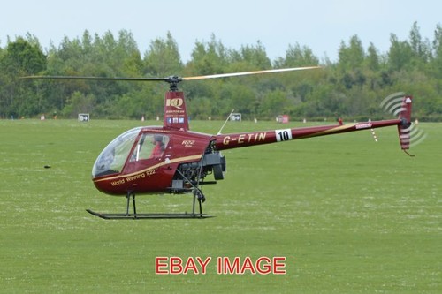 Photo helicopter robinson r22 - helicopter,