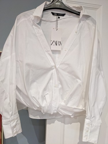 Nuova con etichette - :, camicia