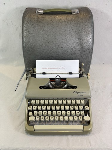 Macchina scrivere olympia - a,