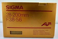Sigma 28-200mm f/3.8-5.6 obiettivo zoom AF con tappi. Usato