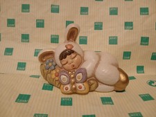 Bimba Coniglio Su Prato Fiori