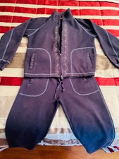 Tuta da donna con chiusura zip colore blu. Ottime condizioni