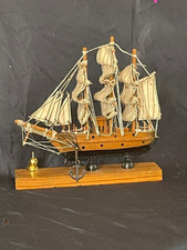 Small vintage wooden sailboat