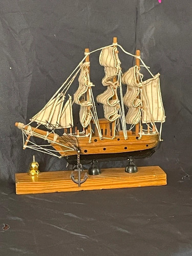 Small vintage wooden sailboat