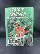 Toto’s Triumph By Claire