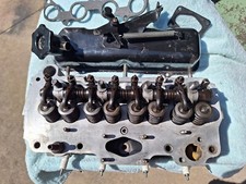 FIAT 850 TESTATA REVISIONATA CON PUNTERIE E CARTER COPRIVALVOLE DELL'EPOCA 