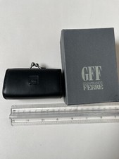 Porta spiccioli a scatto da