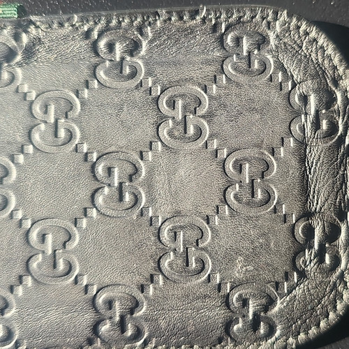 Gucci black embossed logo - embossed,