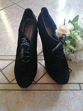 Scarpe nere con tacco modello francesine