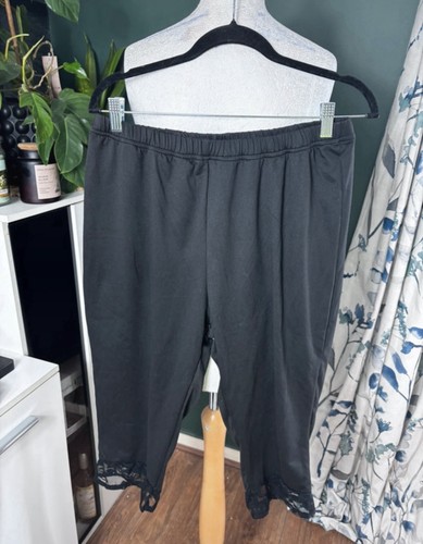 Leggings cropped neri con orlo