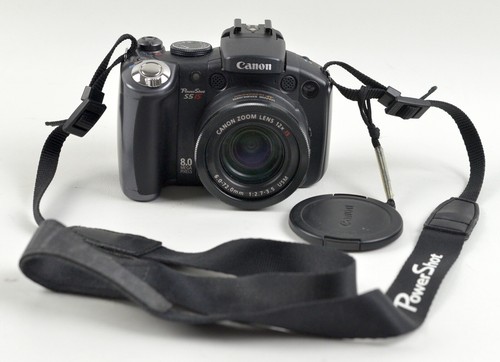 Canon powershot is - s5,