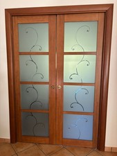 porta scorrevole doppia con vetri decorati. misure 70 ogni anta.