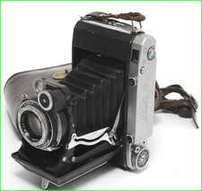 Macchina fotografica vintage - @,