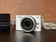 **LEGGI** Nikon 1 J1 +