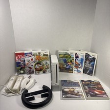 Pacchetto console Nintendo Wii RVL-001 completo con controller + 8 giochi famiglia