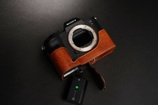 Custodia mezza fotocamera in