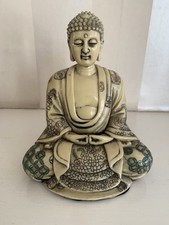 Statuina Buddha seduto tono