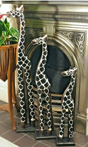 Hand carved wooden giraffe - hand,
