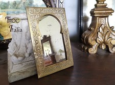 BRASS CHISELED WALL MIRROR