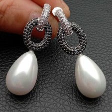 Orecchini a perno pavè