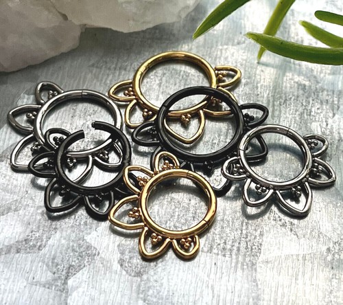 Anello segmento incernierato