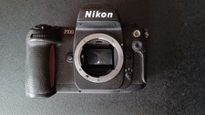 Nikon 100 - f,
