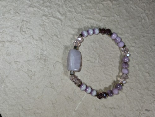 Bracciale elastico fatto - , a