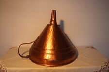 Imbuto in rame storicamente usato per inl travaso del vino.