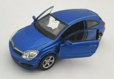 SPEDIZIONE LAMPO OPEL ASTRA GTC 2005 blu/blu Welly modellino auto 1:34 NUOVO & IMBALLO ORIGINALE  