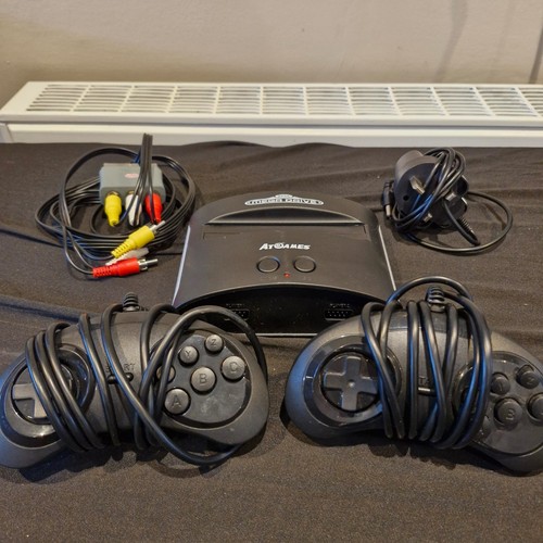 Games console sega - at,