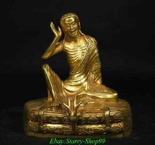 Statua testa di cervo seduta