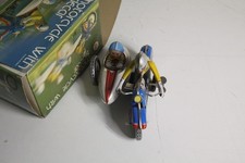 Moto di latta clockwork