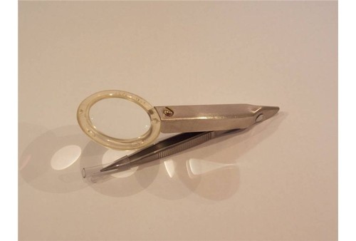 Pinzetta acciaio con - con, lente