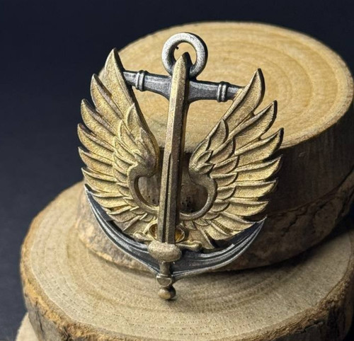 Distintivo berretto metallico