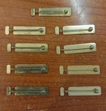 Lotto di 10 spille / pin per