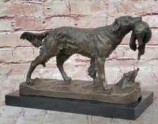Statua bronzo cane pistola