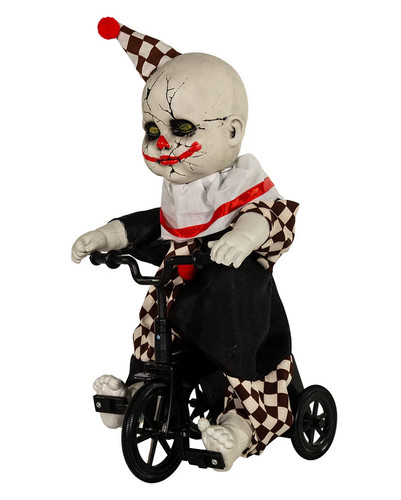 Clown spaventoso con triciclo