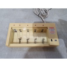 Uniross CX600 Caricabatteria Universale Ni-Cd Beige 1.2-V 180mA 9-V 20mA Spina UK