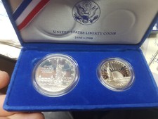 COPPIA MONETE IN COFANETTO  "One and half Dollar Liberty 1886/1996" Proof