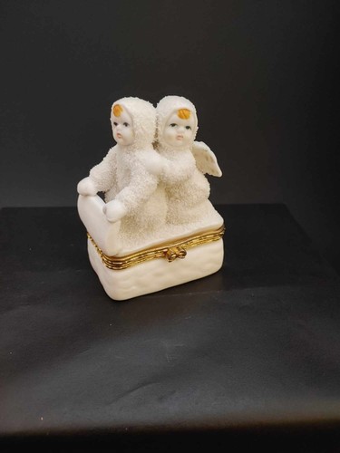 Angeli della neve slitta