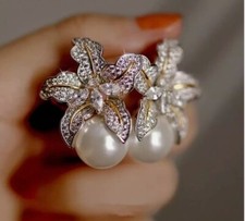 Orecchini Zara perle fiore con