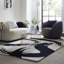 Tappeto trapuntato a mano