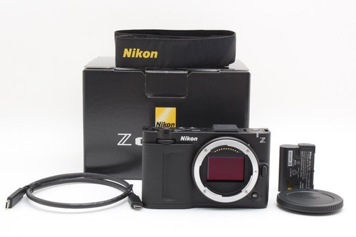 Nikon - , zr