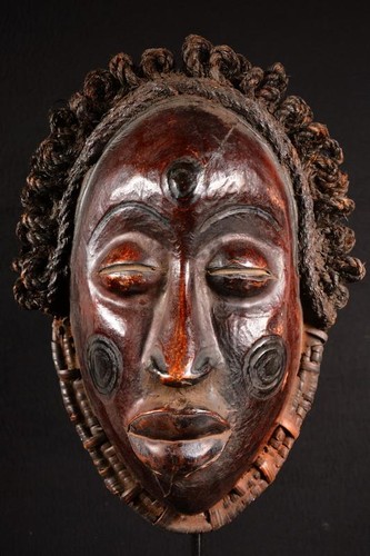 Autentico casco africano - un,