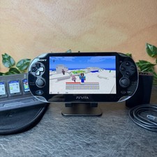 Console Sony Playstation PS Vita Oled PCH-1104 con custodia, caricatore e giochi