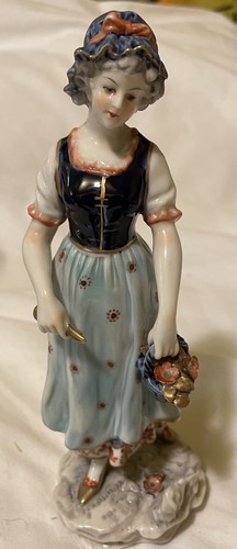 Statuina donna con - , fiori
