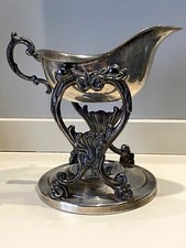 Antica salsiera inclinabile in